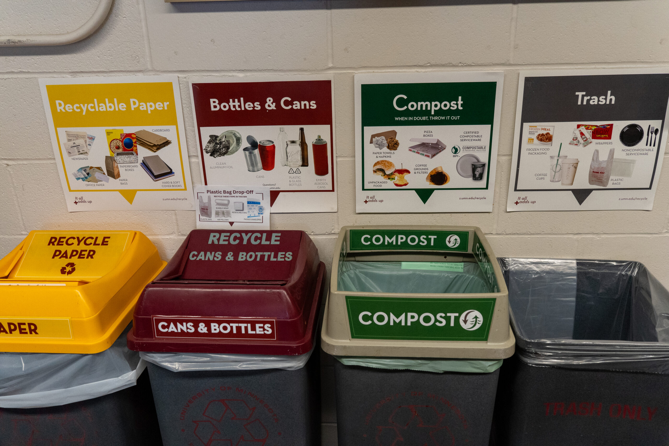 Four different trash cans inside Como Recycling Facility's Scale House in St.paul on April. 9, 2024. | Photo by Rosalind Ding